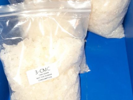 White to off-white crystalline powder of 3-CMC Powder Crystal (3-Chloromethcathinone) research chemical analytical standard in sealed laboratory container.